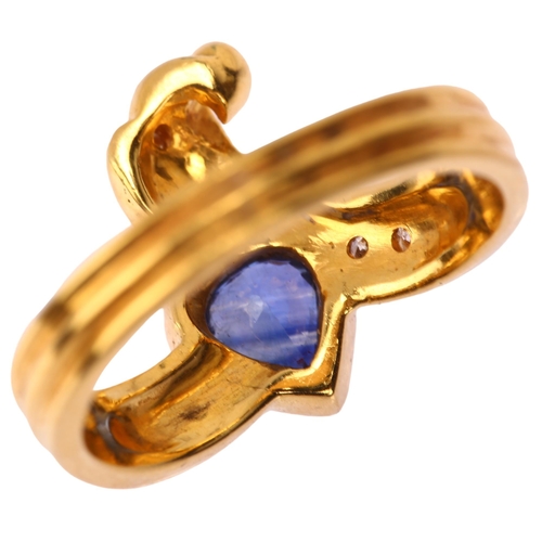 1154 - An 18ct gold sapphire and diamond crossover ring, maker's mark YC, import London 1990, set with pear... 