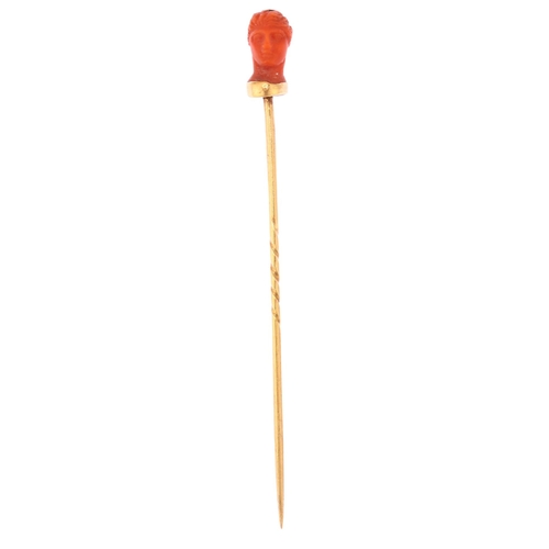 1160 - An Italian 19th century coral head stickpin, circa 1870, unmarked gold settings, head height 11.7mm,... 