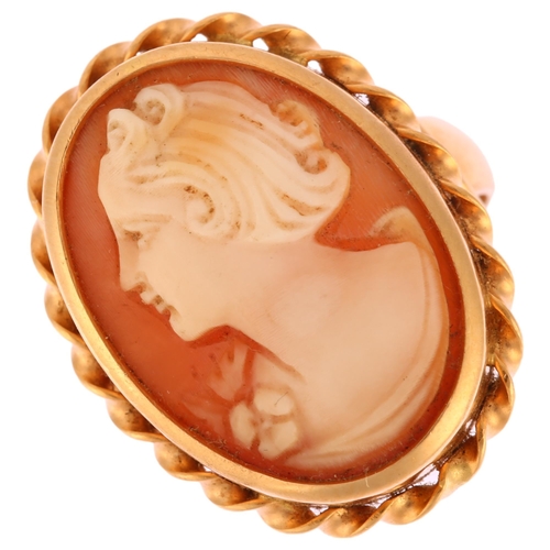 1171 - A Swedish 18ct gold shell cameo ring, relief carved depicting female profile within rope twist surro... 