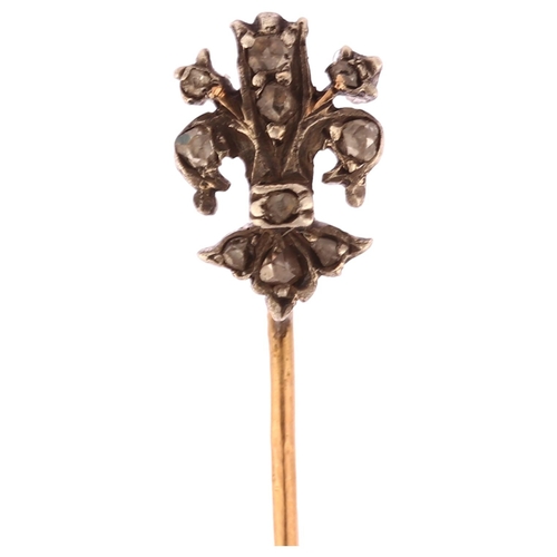 1173 - A 19th century diamond fleur-de-lis stickpin, unmarked gold and silver settings with rose-cut diamon... 