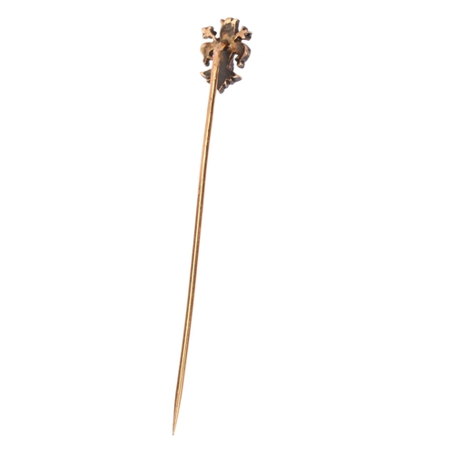 1173 - A 19th century diamond fleur-de-lis stickpin, unmarked gold and silver settings with rose-cut diamon... 