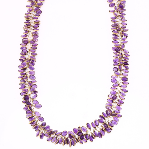 1175 - A modern 9ct gold amethyst grape cluster necklace, set with oval mixed-cut amethysts, necklace lengt... 