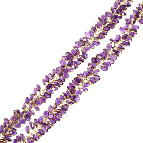 1175 - A modern 9ct gold amethyst grape cluster necklace, set with oval mixed-cut amethysts, necklace lengt... 