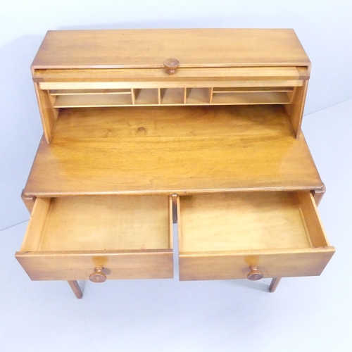 2015 - A mid-century teak writing desk, attributed to Reynolds of Ludlow, the raised compartment having a l... 