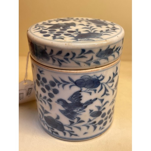 133 - A pair of Chinese blue and white porcelain cylindrical pots, with painted birds (1 lid missing), hei... 