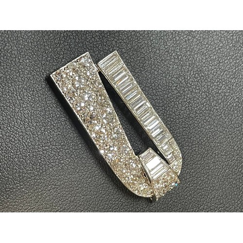 1103 - CARTIER - a pair of Art Deco platinum diamond dress clips, circa 1930s, geometric form, each set wit... 