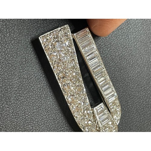 1103 - CARTIER - a pair of Art Deco platinum diamond dress clips, circa 1930s, geometric form, each set wit... 