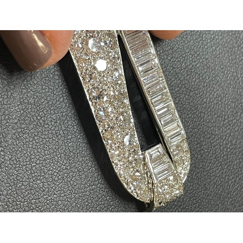 1103 - CARTIER - a pair of Art Deco platinum diamond dress clips, circa 1930s, geometric form, each set wit... 