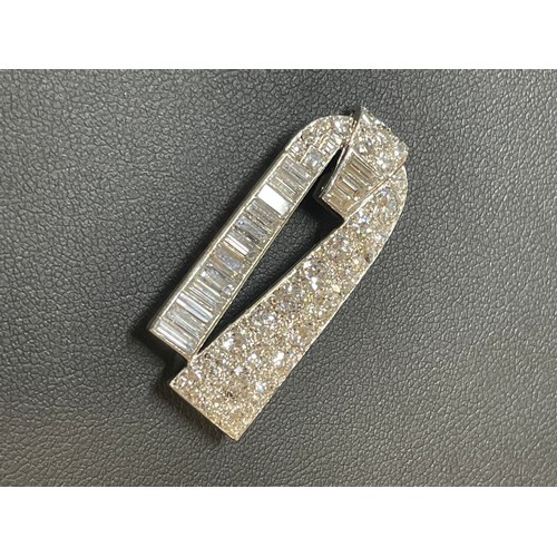 1103 - CARTIER - a pair of Art Deco platinum diamond dress clips, circa 1930s, geometric form, each set wit... 