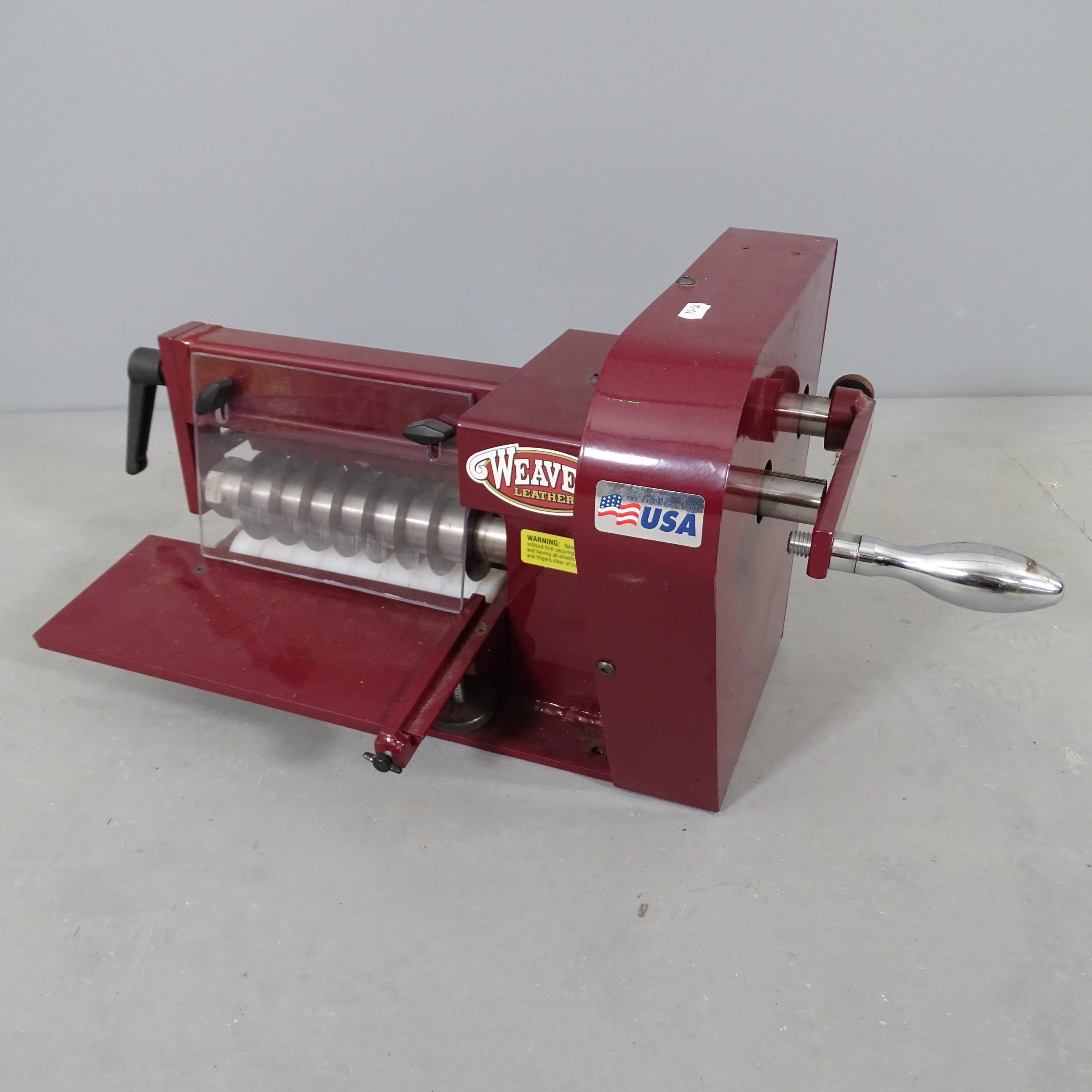 A Weaver leather strap cutter. 66x33x30cm. From the of saddle