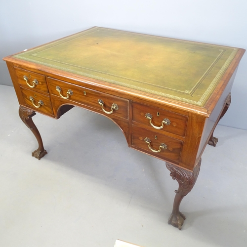 2590 - An antique mahogany Chippendale style partner's desk, with 7 drawers, 1 cupboard door, and tooled an... 