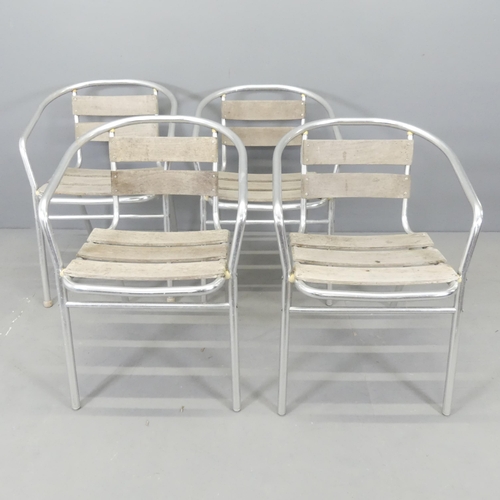 2563 - A set of four aluminium and teak slatted stacking garden chairs.