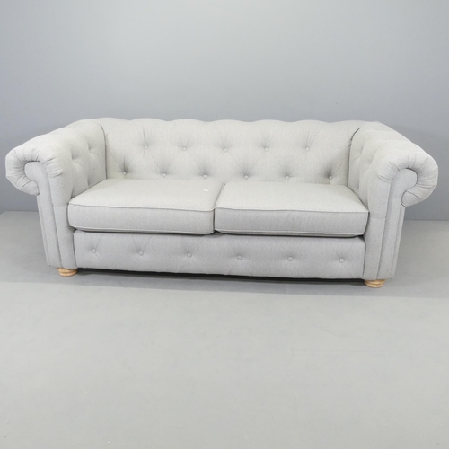 2567 - A modern button-back upholstered Chesterfield style three-seater sofa. Overall 210x75x102cm, seat 14... 