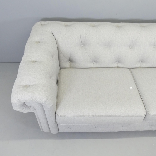 2567 - A modern button-back upholstered Chesterfield style three-seater sofa. Overall 210x75x102cm, seat 14... 