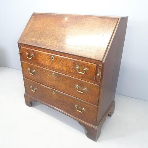 2568 - A Georgian oak bureau. 93x103x47cm.