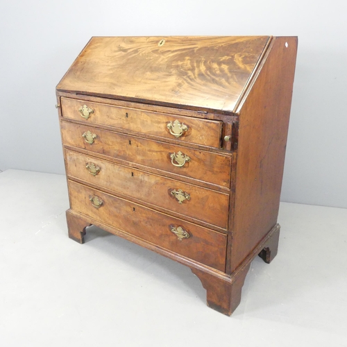 2585 - A Georgian mahogany bureau, the fall front revealing a fitted interior with four long drawers below.... 