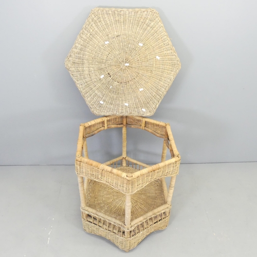 2591 - A hexagonal wicker two-tier centre table, with removable top. 83x82x73cm.