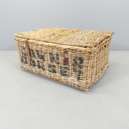 2592 - A vintage wicker laundry basket, named Dawn & Dorset. 67x32x55cm.