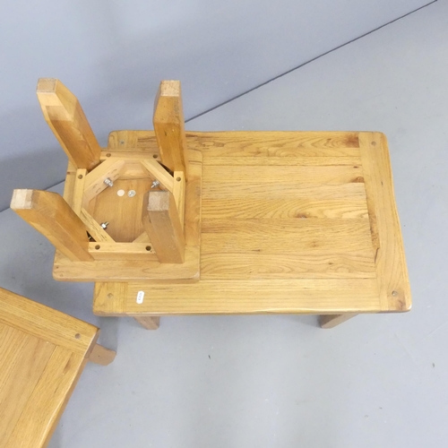 2611 - A modern oak nest of three occasional tables. Largest 65x53x42cm.