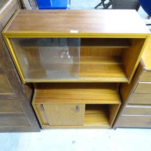 2619 - A mid-century teak display / drinks cabinet, with two glass sliding doors and cupboards under. 77x12... 