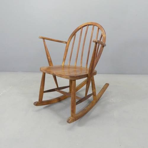 2622 - An Ercol Utility rocking chair, with impressed utility mark to rear of seat.