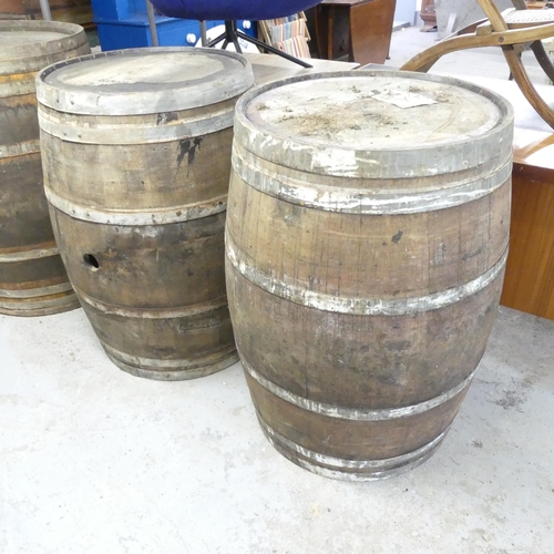 2634 - A pair of vintage coopered oak barrels. Marked 