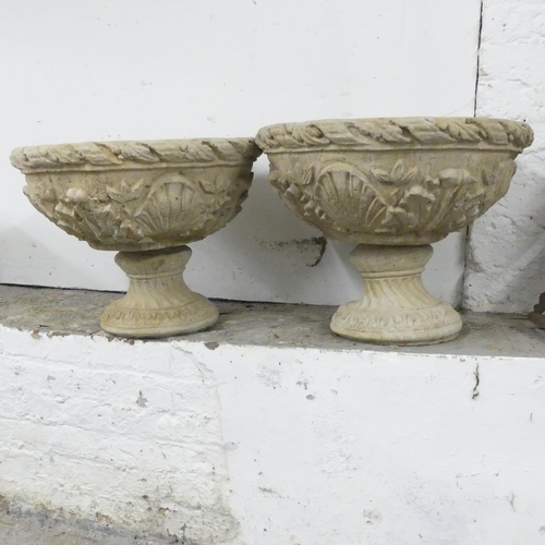 2659 - A pair of modern concrete two section garden urns. 54x44cm.