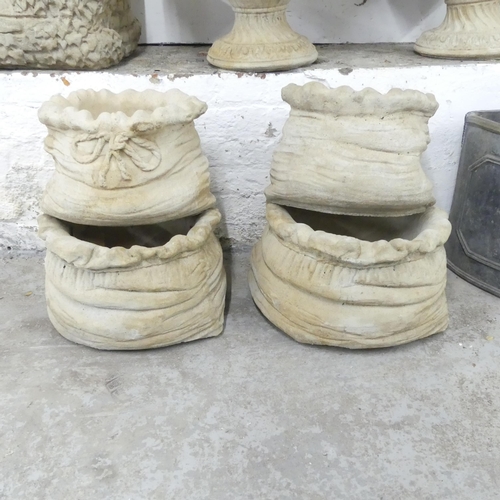 2661 - Two pairs of modern concrete sack design planters. Largest 44x24cm.