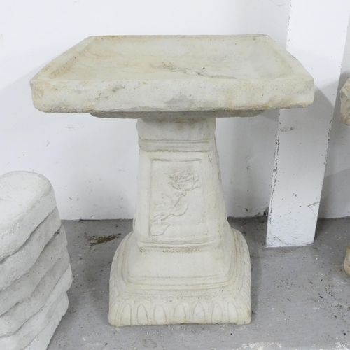 2664 - A modern concrete two-section square topped bird bath, with rose decoration. 40x50cm.