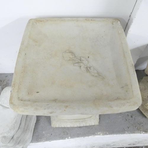 2664 - A modern concrete two-section square topped bird bath, with rose decoration. 40x50cm.