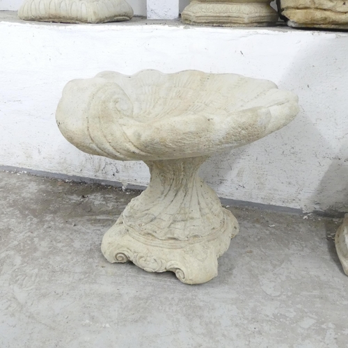 2665 - A modern concrete two-section shell design bird bath. 54x44cm.