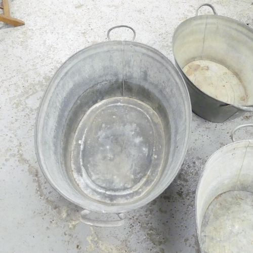 2679 - Three graduated galvanised metal wash basins. Largest 89x32x57cm.