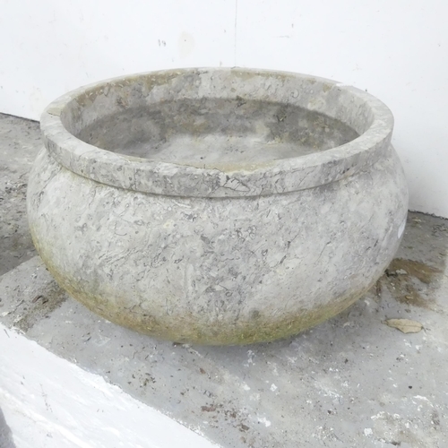 2682 - A reconstituted marble circular garden planter. 44x24cm