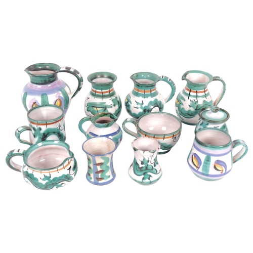 821 - A group of Tintagel and Honiton pottery jugs etc, tallest 12.5cm