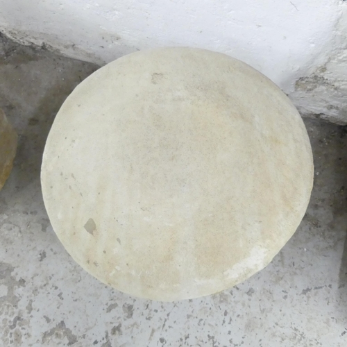 2694 - A pair of modern concrete two section staddle stones. 46x46cm