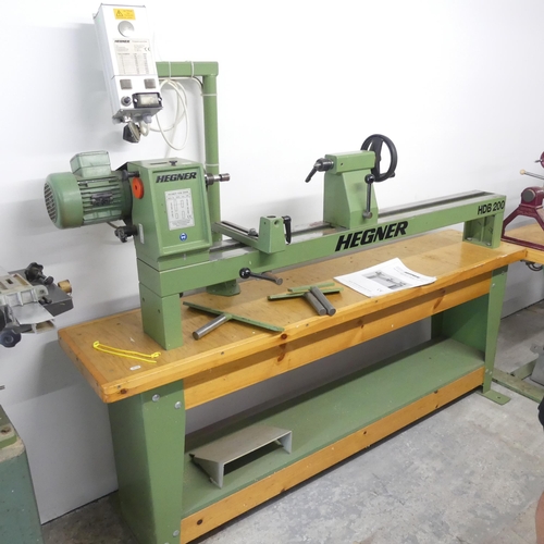 2699 - A HEGNER HBD 200 Woodturning lathe, with original instruction manual. 180x160x50cm.