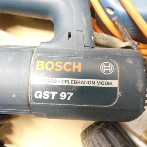 2707 - A box containing a Bosch GST97 jigsaw, a Black and Decker D220 hammer drill, a Bosce PSB 24 VE-2 and... 