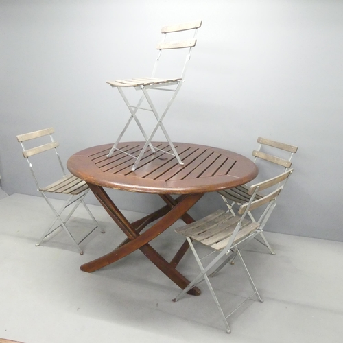 2711 - A teak slatted folding garden table, 120x73cm, and a set of four Parisienne café style folding chair... 