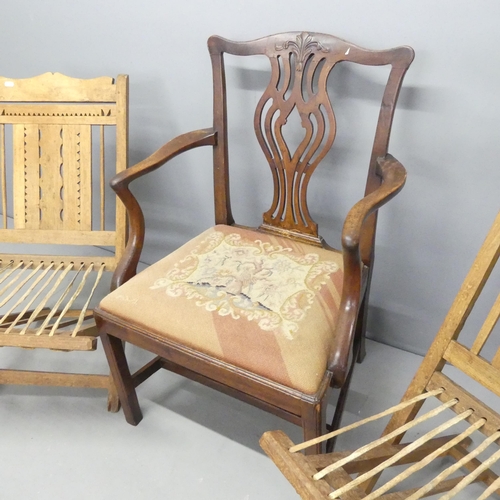 2717 - Two similar folk art style folding chairs, and a Chippendale style mahogany and upholstered open arm... 