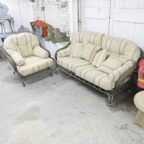 2718 - A modern wrought metal conservatory settee, 184x95x90cm, and a matching arm chair. (2)