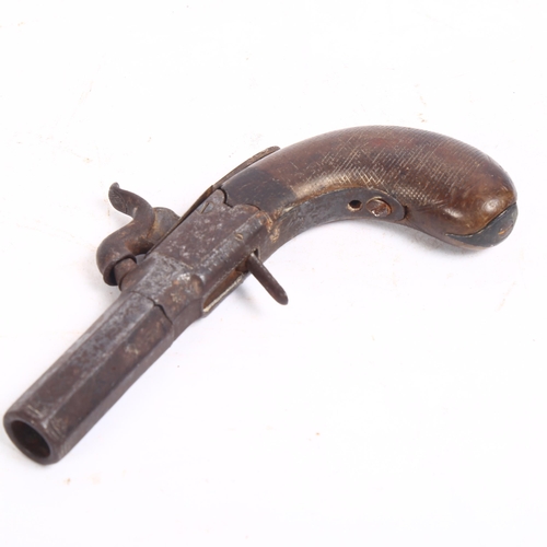 109 - A 19th century miniature muff pistol with screw barrel, L14cm