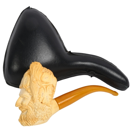 115 - A Meerschaum pipe with a carved man's head bowl, cased