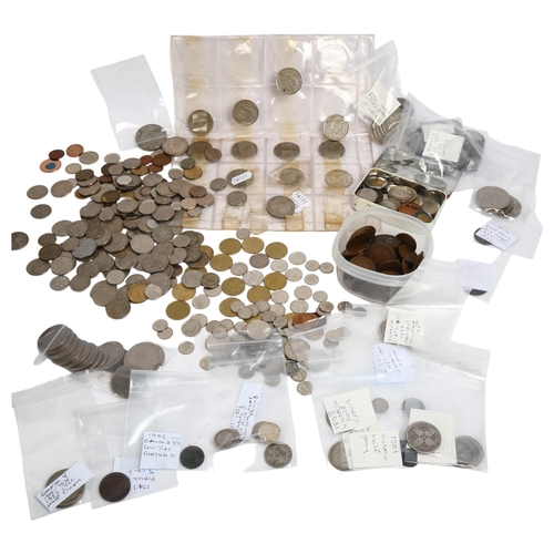 116 - A collection of UK, Europe and worldwide coins, including sixpences, pennies, crowns etc