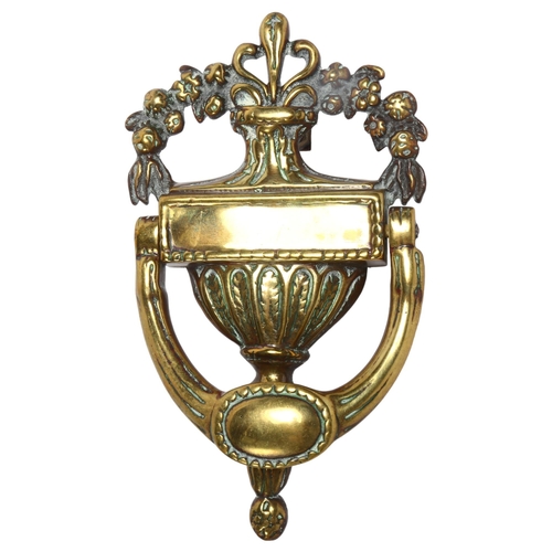 119 - An ornate heavy cast-brass door knocker, ribbon decoration, L20cm