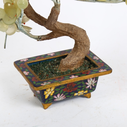 127 - 2 Oriental design hardstone trees, 1 in a cloisonne stand, tallest 20cm