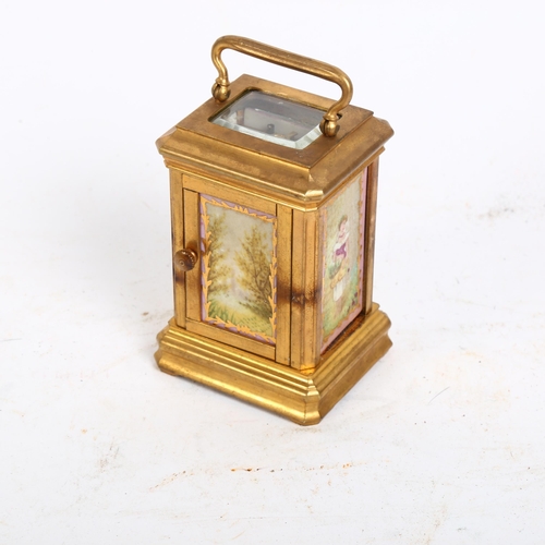 128 - A miniature modern brass-cased carriage clock, with painted ceramic panels, height not including the... 