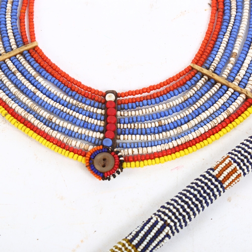 139 - A Massai Samburu multi-strand bead collar necklace, and beadwork stick (2)