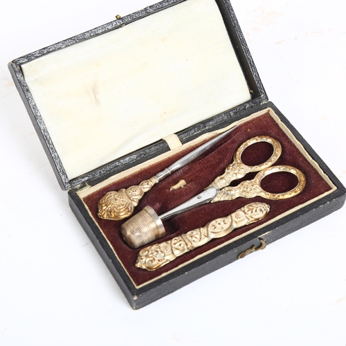 141 - A Victorian cased 4-piece etui set, boxed with gilded decoration