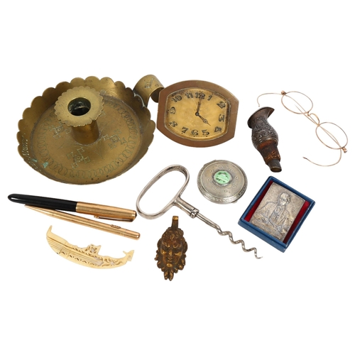 150 - A collection of various items,, including a travelling clock, chamber stick, corkscrew, spectacles e... 