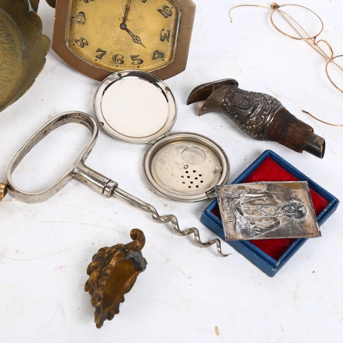 150 - A collection of various items,, including a travelling clock, chamber stick, corkscrew, spectacles e... 